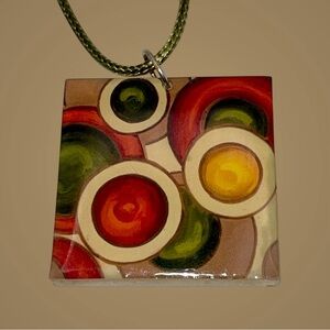 Rare Signed Artisan Ka Dea Abstract Art Diz Red Resin Pendant on a Green Cord
